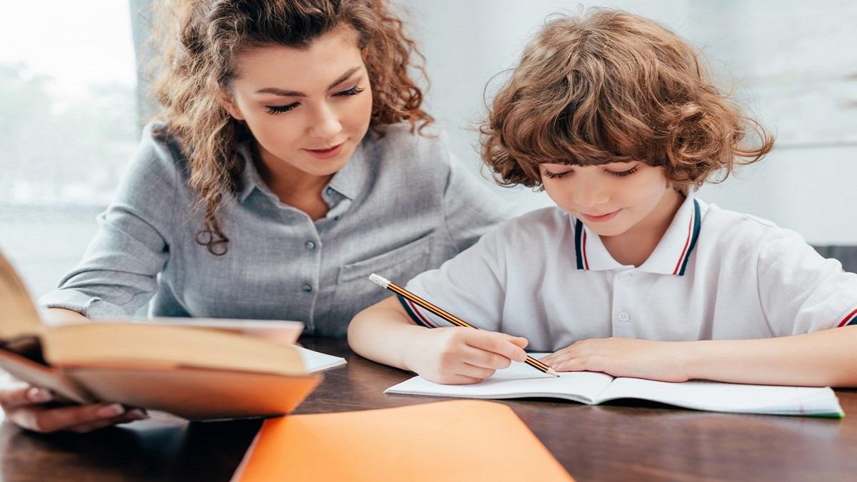Tutor and student studying